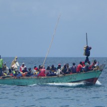 Crowded little boat on the Indian Ocean